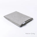 Folded Spare Cover for Charley Chau's Luxury Bliss Bolster Dog Bed in a grey woven upholstery fabric