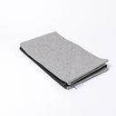 Folded Spare Cover for Charley Chau's Luxury Bliss Bolster Dog Bed in a grey woven upholstery fabric.