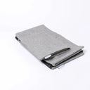 Folded Spare Cover for Charley Chau's Luxury Bliss Bolster Dog Bed in a grey woven upholstery fabric.