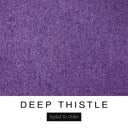 A close-up of the rich deep purple machine washable dog bed fabric swatch used for Charley Chau spare dog bed covers for the bolster dog bed, with the text 'DEEP THISTLE' and 'Styled To Order' below.