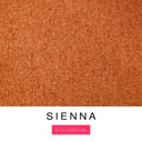 A close-up of the warm burnt orange machine washable dog bed fabric swatch used for Charley Chau spare dog bed covers for the bolster dog bed, with the text 'SIENNA' and 'Core Collection' below.