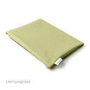 A folded Spare Dog Bed Cover in a resilient, hard-wearing upholstery fabric in pale green on a white backdrop.