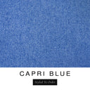 A close-up of the rich denim blue machine washable dog bed fabric swatch used for Charley Chau spare dog bed covers for the bolster dog bed, with the text 'CAPRI BLUE' and 'Styled To Order' below.