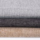 Close up of three folded Spare Dog Bed Covers in  a textured upholstery fabric in grey, dark brown and beige for Charley Chau luxury odg beds.