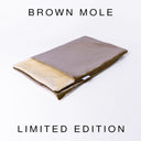 A spare Snuggle Bed / Burrow Bag Cover in the Classic Blanket Top style in Velour Brown Mole taken on a white backdrop.