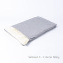 A spare Snuggle Bed / Burrow Bag Cover in the Classic Blanket Top style in Weave II Heron Grey taken on a white backdrop.