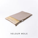 A folded spare dog bed cover to fit Charley Chau Snuggle Dog Beds and Burrow Bags with warm taupe grey outer cover in upholstery-quality Velour and plush cream faux-fur lining on a white backdrop.