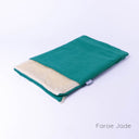 A spare Snuggle Bed / Burrow Bag Cover in the Classic Blanket Top style in Faroe Jade taken on a white backdrop.