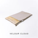 A folded spare dog bed cover to fit Charley Chau Snuggle Dog Beds and Burrow Bags with light grey outer cover in upholstery-quality Velour and plush cream faux-fur lining on a white backdrop.