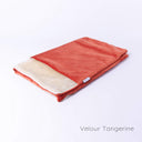 A spare Snuggle Bed / Burrow Bag Cover in the Classic Blanket Top style in Velour Tangerine taken on a white backdrop.