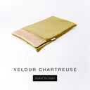 A folded spare dog bed cover to fit Charley Chau Snuggle Dog Beds and Dog Burrow Bags with chartreuse outer cover in upholstery-quality Velour and plush cream faux-fur lining on a white backdrop.