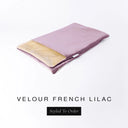 A folded spare dog bed cover to fit Charley Chau Snuggle Dog Beds and Dog Burrow Bags with mid purple outer cover in upholstery-quality Velour and plush cream faux-fur lining on a white backdrop.