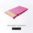 A folded spare dog bed cover to fit Charley Chau Snuggle Dog Beds and Dog Burrow Bags with bright fuchsia pink outer cover in upholstery-quality Velour and plush cream faux-fur lining on a white backdrop.