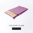 A folded spare dog bed cover to fit Charley Chau Snuggle Dog Beds and Dog Burrow Bags with deep plum purple outer cover in upholstery-quality Velour and plush cream faux-fur lining on a white backdrop.