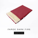 A folded spare dog bed cover to fit Charley Chau Snuggle Dog Beds and Dog Burrow Bags with deep red outer cover in woven wool texture upholstery-quality Faroe and plush cream faux-fur lining on a white backdrop.
