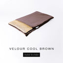 A folded spare dog bed cover to fit Charley Chau Snuggle Dog Beds and Dog Burrow Bags with rich brown outer cover in upholstery-quality Velour and plush cream faux-fur lining on a white backdrop.