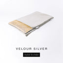A folded spare dog bed cover to fit Charley Chau Snuggle Dog Beds and Dog Burrow Bags with silver grey outer cover in upholstery-quality Velour and plush cream faux-fur lining on a white backdrop.