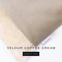 A close up detail of the corner of a Charley Chau Dog Snuggle Bed and dog Burrow Bag Dog Bed Cover with beige outer cover in upholstery-quality Velour and plush cream faux-fur lining with a woven brand label showing the Charley Chau logo on a white backdrop.