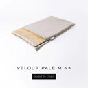 A folded spare dog bed cover to fit Charley Chau Snuggle Dog Beds and Dog Burrow Bags with pale taupe outer cover in upholstery-quality Velour and plush cream faux-fur lining on a white backdrop.