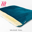 Charley Chau Dog Snuggle Bed and Dog Burrow Bag Spare Bed Cover in Teal Velvet with cream faux-fur lining on a white backdrop. 
