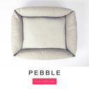 Top-down view of the Bliss Bolster Dog Bed in a warm stone grey 'PEBBLE' Faroe fabric, showing the raised sides and deep cushioned base of this long lasting dog bed with sides; a comfortable bolster dog bed and high-wall dog bed for everyday use.