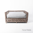 A stylish raised rattan dog bed with deep-filled luxury dog bed mattress in pale grey on a white backdrop.
