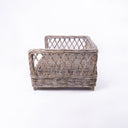 Side view of The Raised Rattan Dog Bed  by luxury dog bedding designers Charley Chau.
