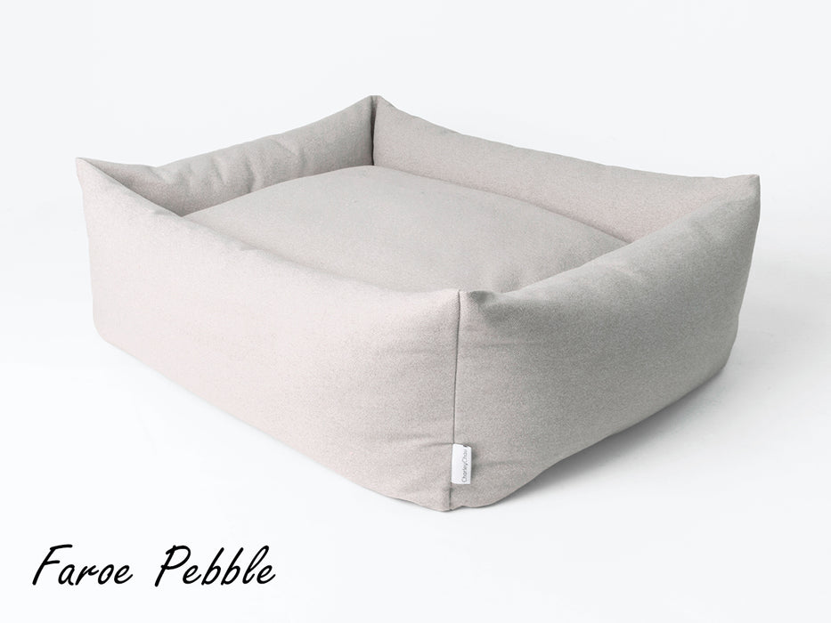 The Bliss Bolster Dog Bed by Charley Chau - feather-filled bolster nest 