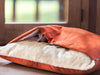 Charley Chau Snuggle Bed in Velour Tangerine