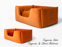 Orange velvet high-sided Deeply Dishy Dog Bed with a contrasting red velvet mattress.
